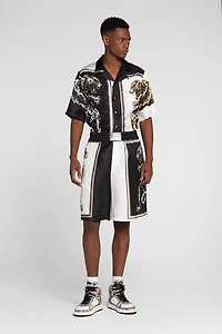 Panther-print knee-length shorts