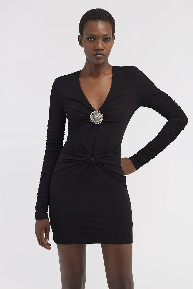 Short dress with ruffles and stones