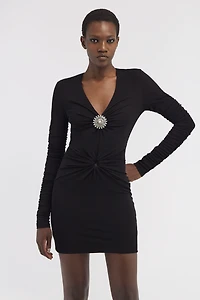 Short dress with ruffles and stones