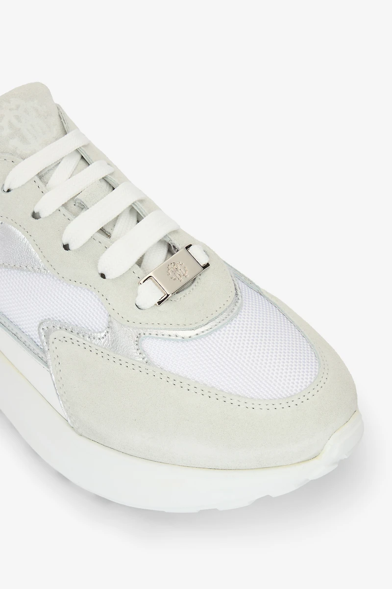 Laced sneakers with mixed inserts