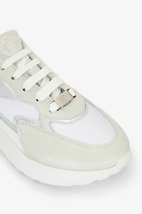 Laced sneakers with mixed inserts