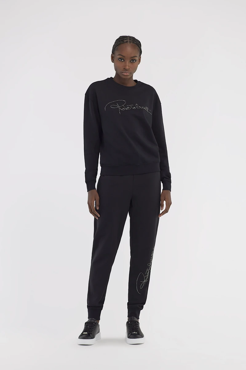 Sporty pants with signature