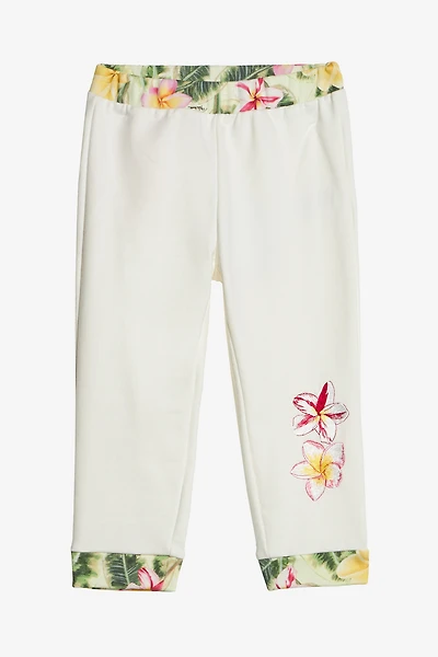 Pants With Embroidered Flowers And RC Monogram