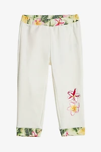 Pants With Embroidered Flowers And RC Monogram