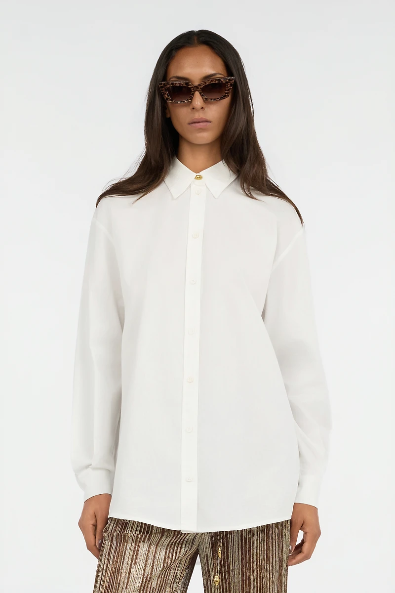 White Shirt With Gold Button