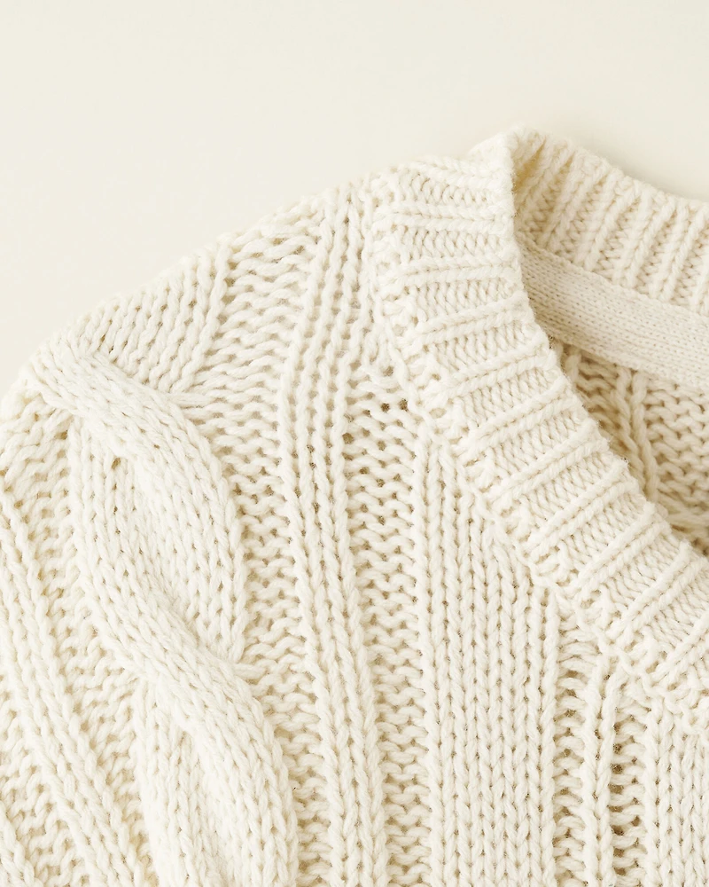 Robe en tricot à col V et torsades pour toutes-petites