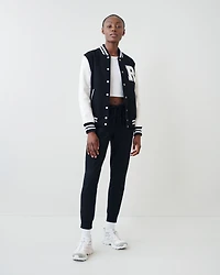Pantalon original ajusté à cheville côtelée en molleton de coton bio