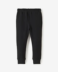 Pantalon ajusté à cheville côtelée en molleton de coton bio pour toutes-petites