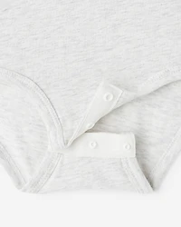 Combinaison à manches courtes Cooper en coton bio pour bébés