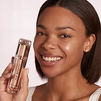 Minisérum illuminant et raffermissant avec niacinamide That JLo Glow