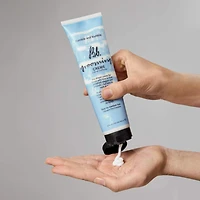 Crème de soin coiffante