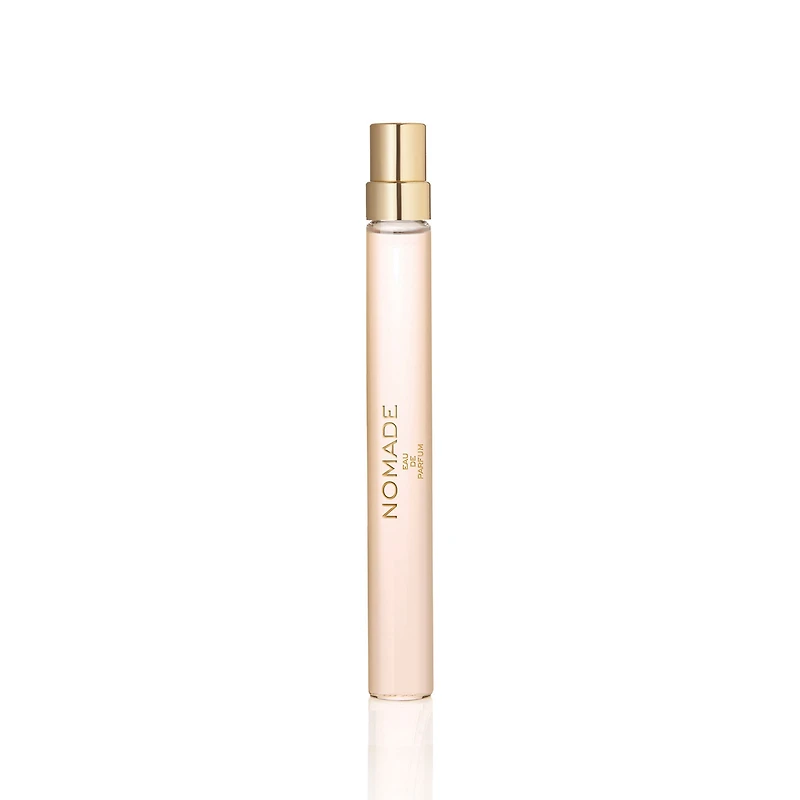 Eau de parfum Nomade avec fleur de freesia, myrobolan et mousse de chêne en vaporisateur de voyage