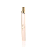 Eau de parfum Nomade avec fleur de freesia, myrobolan et mousse de chêne en vaporisateur de voyage