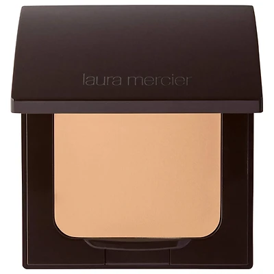 Poudre compacte fixante translucide