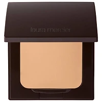Poudre compacte fixante translucide