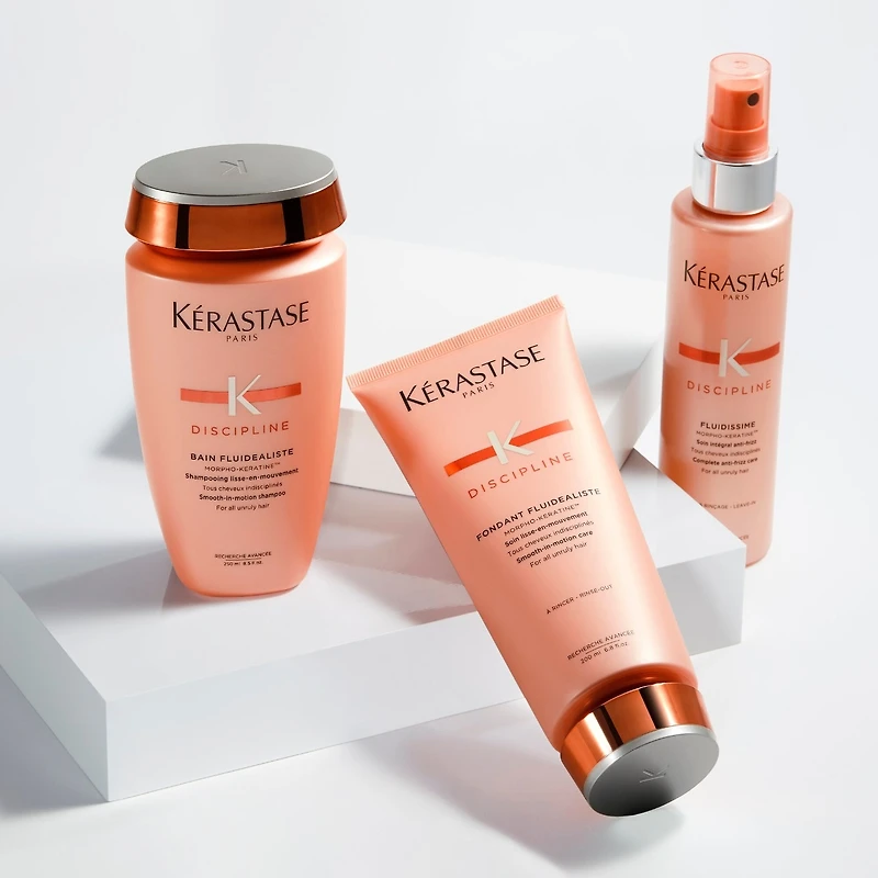 Revitalisant lissant Discipline pour cheveux frisés