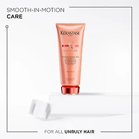 Revitalisant lissant Discipline pour cheveux frisés