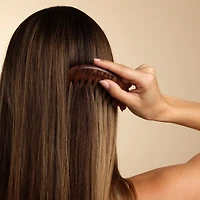 Peigne masseur pour cuir chevelu