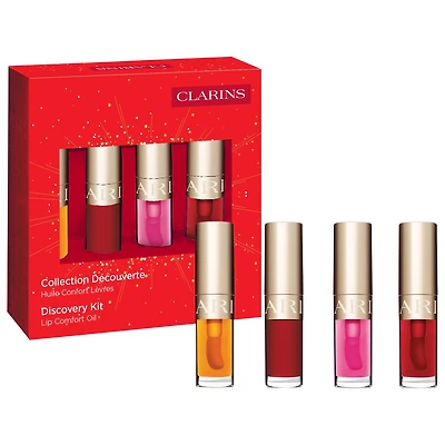 Clarins Lip Comfort Oil Discovery Kit This must-have set is sure to bring a smile to your lips. The iconic Lip Comfort Oil comes in four addictive miniature shades for a delectable pout: Honey, Cherry, Pitaya, and Strawberry. Each oil leaves the lips beau