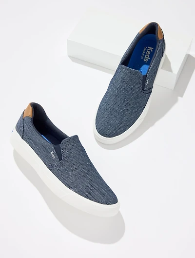 Keds® Chambray Pursuit Slip-On Sneakers