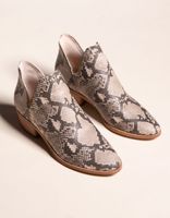 DOLCE VITA Chop Out Snake Print Stella Booties