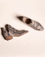 DOLCE VITA Chop Out Snake Print Stella Booties