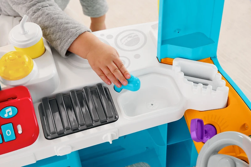 Fisher-Price - Rires et Éveil - Camion-restaurant Bouchée de plaisir - Édition anglaise