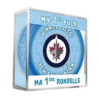 Logo du nouveau fan des Winnipeg Jets de la LNH sur une rondelle bleue dans un cube