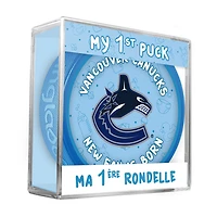 Logo du nouveau fan des Vancouver Canucks de la LNH sur une rondelle bleue dans un cube