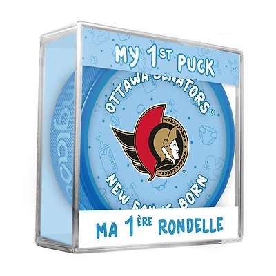 Logo du nouveau fan des Ottawa Senators de la LNH sur une rondelle bleue dans un cube