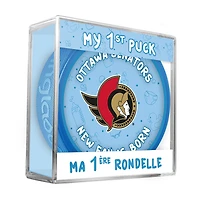 Logo du nouveau fan des Ottawa Senators de la LNH sur une rondelle bleue dans un cube