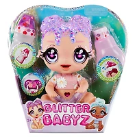Poupon GLITTER BABYZ Lila Wildboom avec 3 changements de couleur magiques / poupée aux cheveux lavande avec des fleurs sur la tenue et couche réutilisable, biberon et sucette