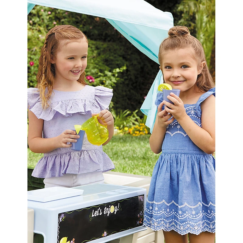 Little Tikes Backyard Bungalow Roleplay Playhouse with pretend kitchen, garden, and canopy