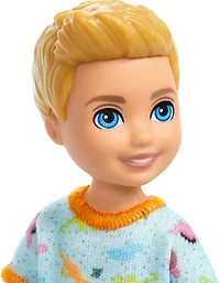 Barbie Chelsea Doll, Small Boy Doll Wearing Removable One-Piece with Dino Print, Blond Hair & Blue Eyes
