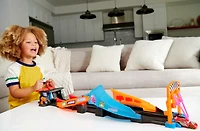 Disney and Pixar Cars Glow Racers Launch & Criss-Cross Playset with 2 Glow-in-the-Dark Vehicles