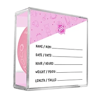 Logo du nouveau fan des Toronto Maple Leafs de la LNH sur une rondelle rose dans un cube