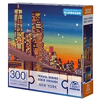 Puzzles Spin Master, New York, Puzzle BlueBoard de 300 pièces de la série Voyage représentant la silhouette des immeubles de Manhattan et le pont de Brooklyn, avec poster