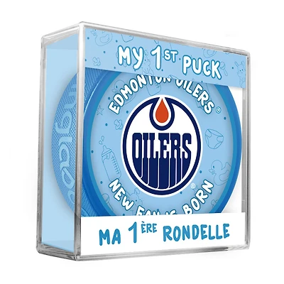 Logo du nouveau fan des Edmonton Oilers de la LNH sur une rondelle bleue dans un cube