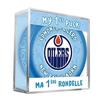 Logo du nouveau fan des Edmonton Oilers de la LNH sur une rondelle bleue dans un cube