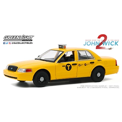 1:24 John Wick: Chapitre 2 (2017) - 2008 Ford Crown Victoria Taxi - Édition anglaise - les motifs peuvent varier