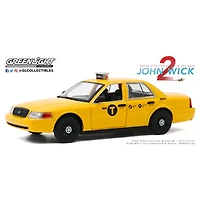 1:24 John Wick: Chapitre 2 (2017) - 2008 Ford Crown Victoria Taxi - Édition anglaise - les motifs peuvent varier
