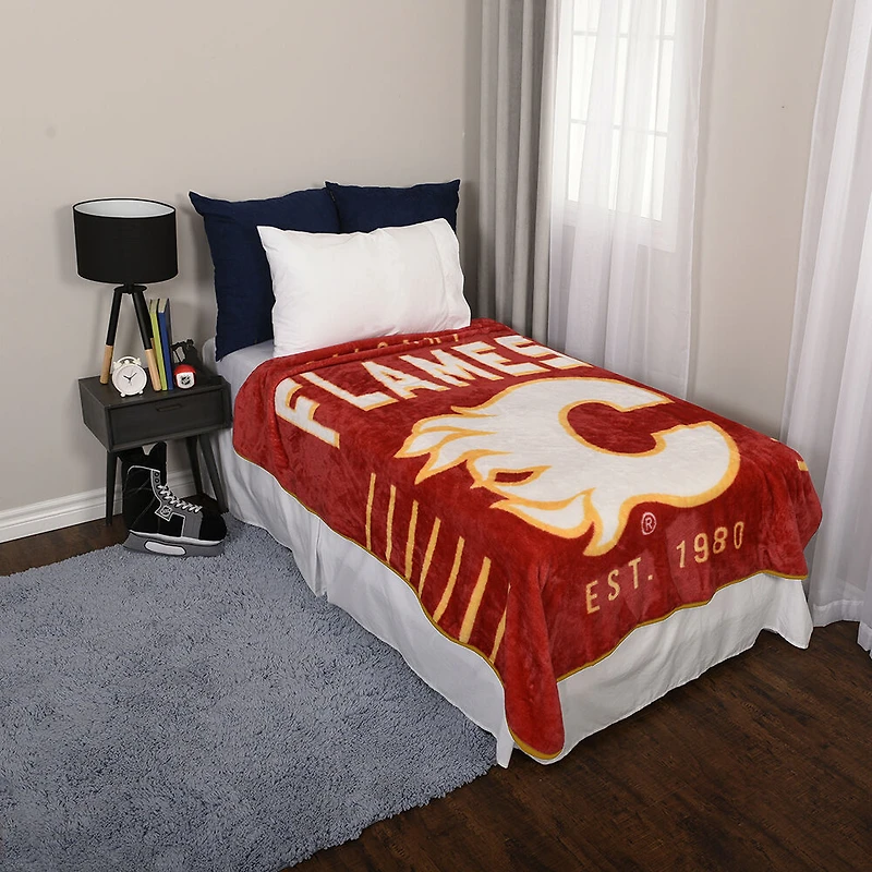 Couverture douce en peluche des Flames de Calgary de la LNH ( x pouces