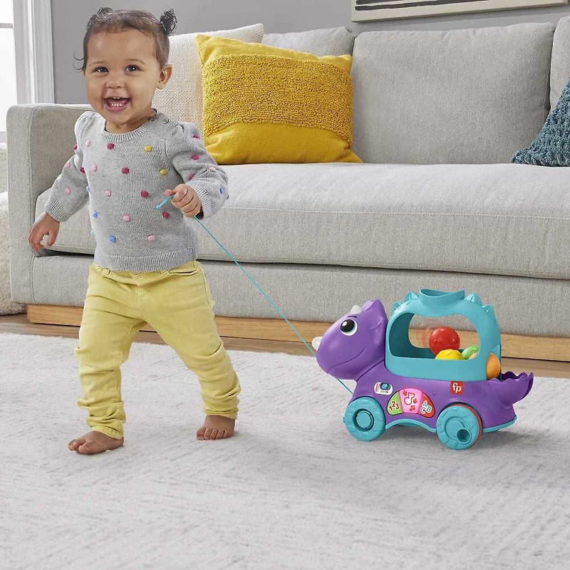 Fisher-Price Toddler Poppin' Triceratops Dinosaur Pull Toy - Multi-Language Version