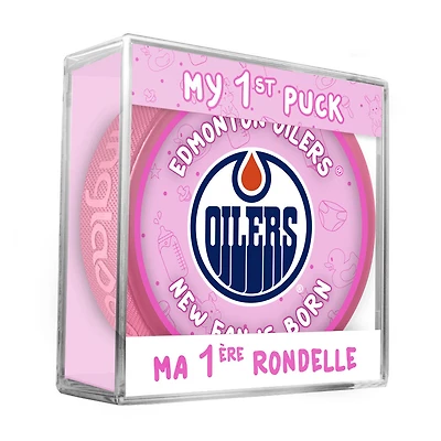 Logo du nouveau fan des Edmonton Oilers de la LNH sur une rondelle rose dans un cube