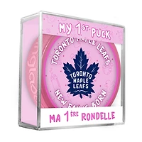 Logo du nouveau fan des Toronto Maple Leafs de la LNH sur une rondelle rose dans un cube