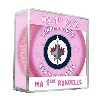 Logo du nouveau fan des Winnipeg Jets de la LNH sur une rondelle rose dans un cube