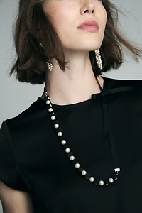 Collier de perles avec ruban noir