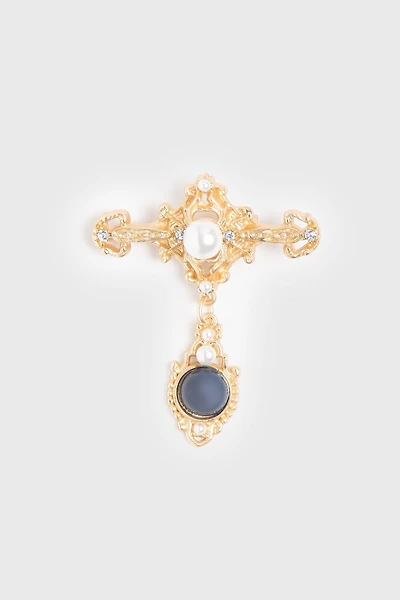 Broche dorée à perles