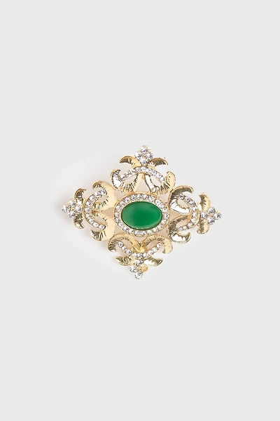 Broche dorée à pierre verte