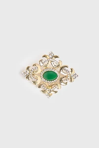 Broche dorée à pierre verte
